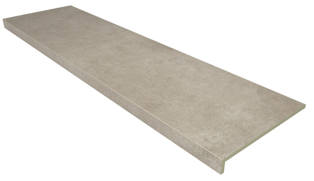 peldaño-porcelanico-extruido-escaleras-interiores.jpg Detalle de peldaño de una sola pieza y zanquín de Gres Aragón para el revestimiento seguro y estético de escaleras de interior.
